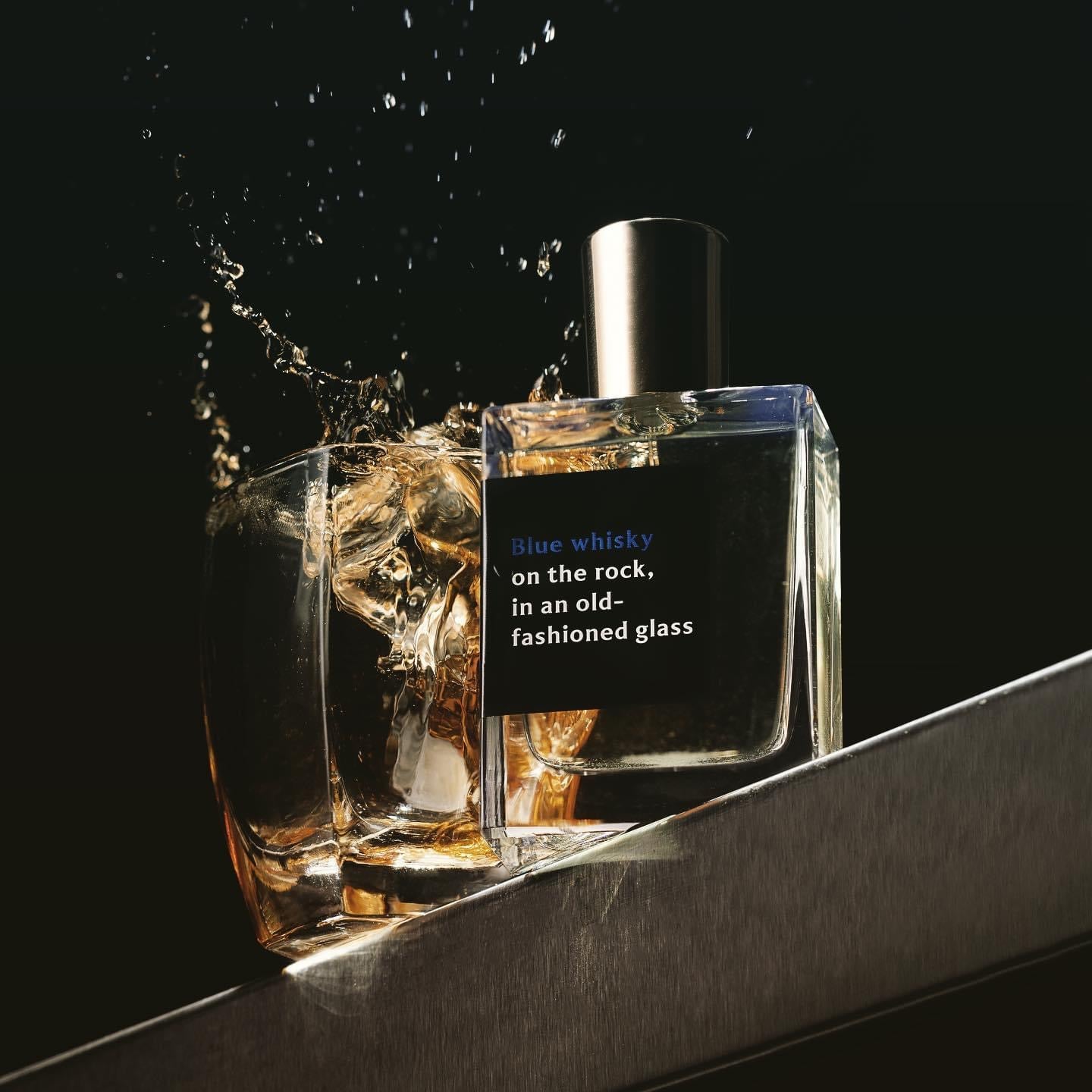 Blue Whisky on the rock, in an old-fashioned glass