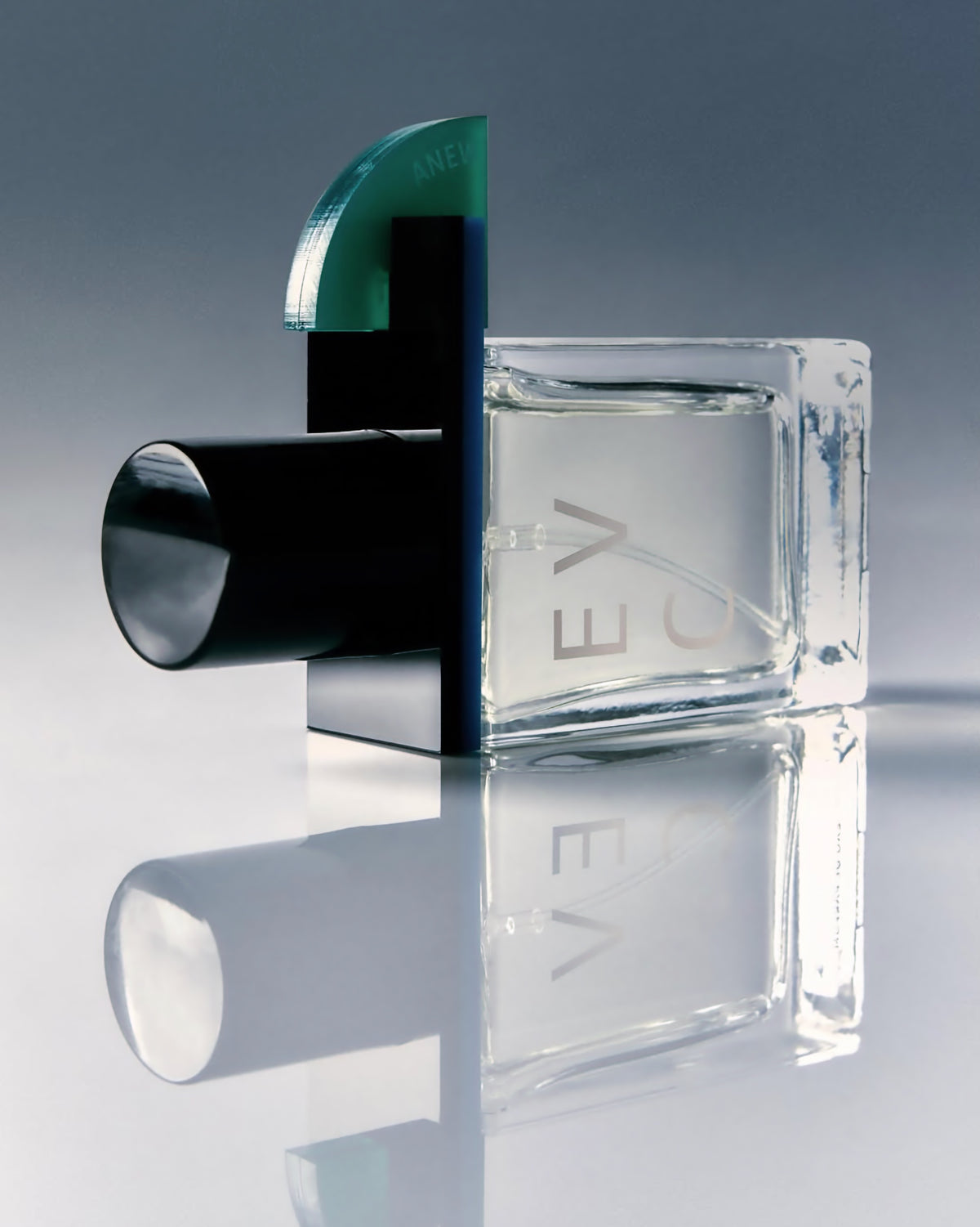 Anew by EVC lying on a reflective surface
